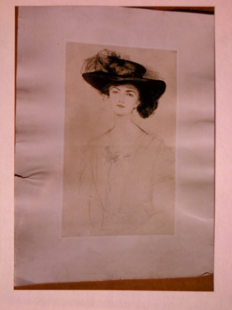 A sketch of a woman wearing a large hat, with faint outlines and minimal shading, displayed against a beige background.